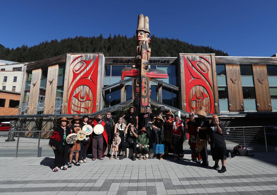 A multicultural dance group "Yees Ku Oo" made up of several Alaska Native Nations posed for a group photo following their performance across from the Sealaska Heritage Institute in Juneau, Alaska, on Aug. 27, 2023.