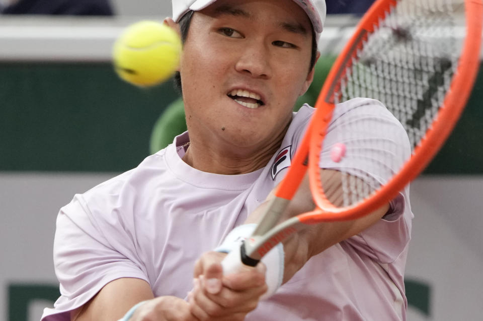 Korea's Soonwoo Kwon hits return to Italy's Matteo Berrettini during their third round match on day 7, of the French Open tennis tournament at Roland Garros in Paris, France, Saturday, June 5, 2021. (AP Photo/Christophe Ena)