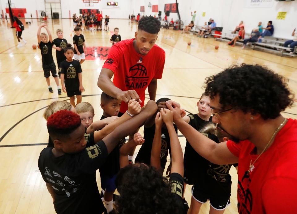 Jarrett Culver fist bumps his campers at the Jarrett Culver Basketball Camp at the Apex Event Center on Tuesday, July 19, 2022. (Mark Rogers/For A-J Media)