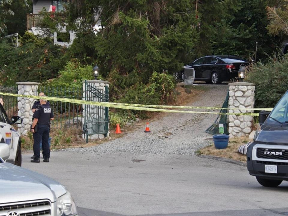 Police were on scene overnight after a fatal shooting on 19th Avenue in South Surrey, B.C., Saturday. (Shane MacKichan - image credit)