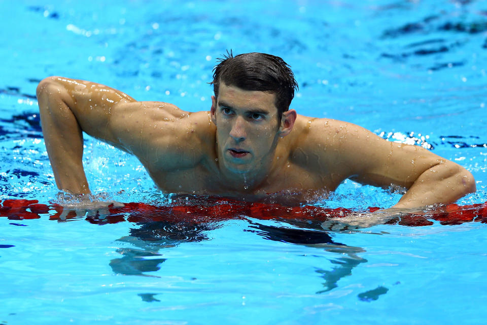 1. If Michael Phelps were his own country, where would his all-time medal count rank? <b>(Click to the next slide for the answer.)</b><br><br> A) 35th<br> B) 58th<br> C) 89th<br> D) 101st<br><br> (Photo by Paul Gilham/Getty Images)