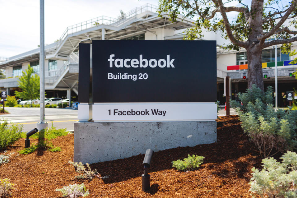 Facebook sign and building in California.