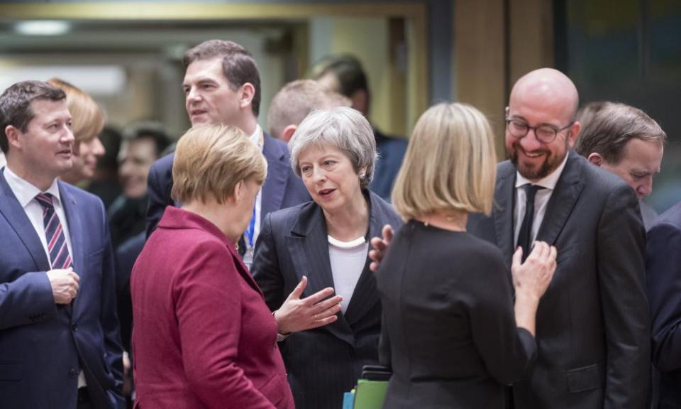 Theresa May seeks help for her deal from Angela Merkel (centre left) in Brussels last week.