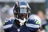 Seattle Seahawks defensive back Phillip Adams warms up prior to the NFL game against the Tennessee Titans