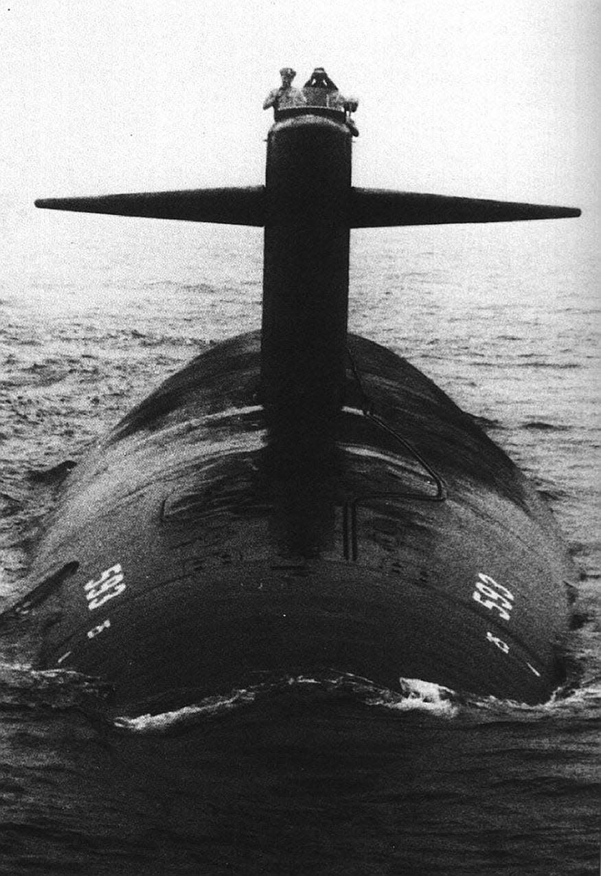 USS Thresher is seen during early sea trials. The nuclear-powered submarine sank and imploded off the coast of Massachusetts, claiming the lives of all 129 men on board on April 10, 1963.