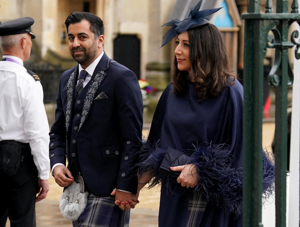 First Minister of Scotland Humza Yousaf and his wife Nadia El-Nakla arrive at Westminster Abbey ahead of the Coronation of King Charles III and Queen Camilla on May 6, 2023 in London, England.  / Credit: Andrew Milligan / Getty Images