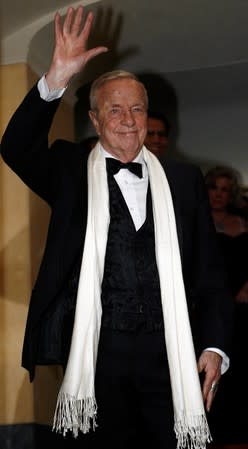 FILE PHOTO: Italian movie director Franco Zeffirelli waves at La Scala opera house in Milan