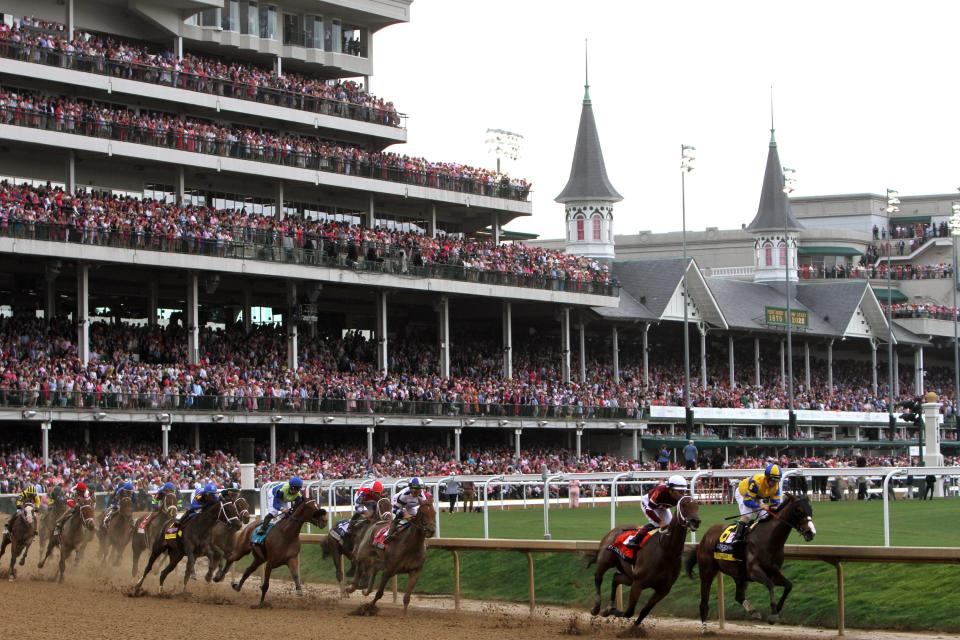 Yuugiri with jockey Florent Geroux up leads the pack into the first turn of the 148th running of the Kentucky Oaks  Friday, May 6, 2022 in Louisville Ky.