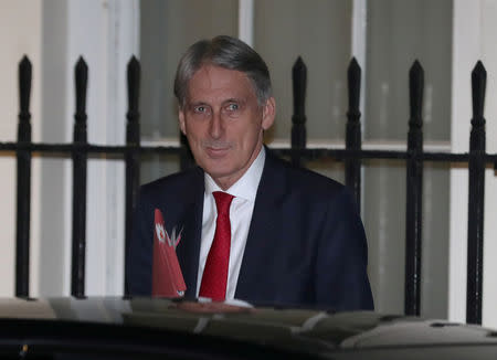 Britain's Chancellor of the Exchequer Philip Hammond leaves 11 Downing Street in London, Britain, November 13, 2018. REUTERS/Simon Dawson