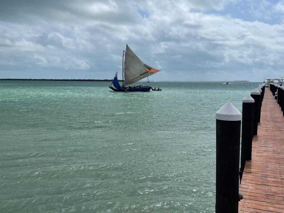 A sailboat authorities say ferried more than 100 Haitian migrants floats off Summerland Key in the Lower Florida Keys Monday, March 14, 2022.