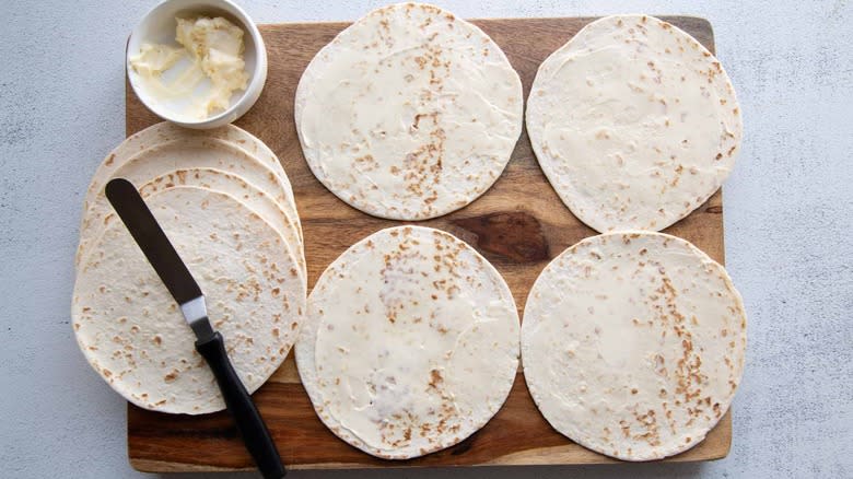 tortillas spread with mayonnaise