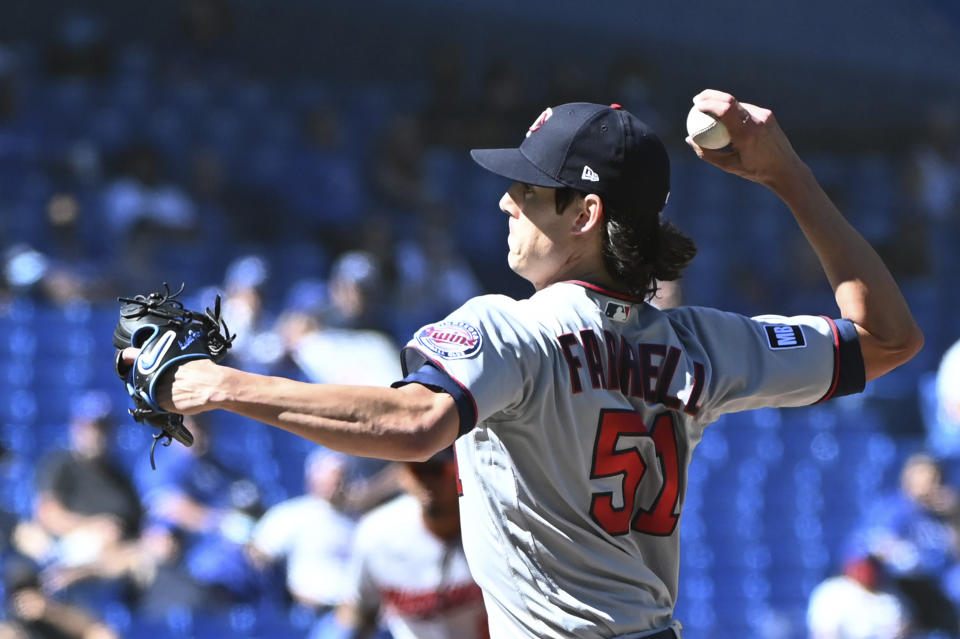 Minnesota Twins starting pitcher Luke Farrell pitches in the first inning of a baseball game against the Toronto Blue Jays in Toronto on Sunday, Sept. 19, 2021. (Jon Blacker/The Canadian Press via AP)