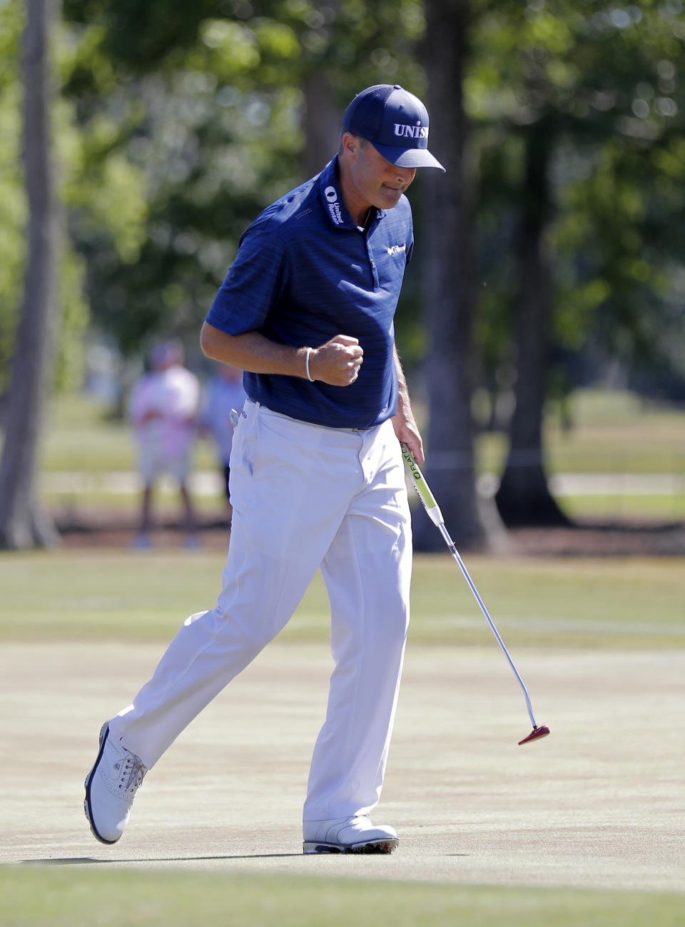 Ryan Palmer pumps his fist after he made a birdie putt on the 14th green during the final round of the PGA Zurich Classic golf tournament at TPC Louisiana in Avondale, La., Sunday, April 28, 2019. Palmer and teammate Jon Rahm won the tournament. (AP Photo/Gerald Herbert)