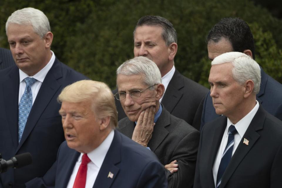<div class="inline-image__caption"><p>Dr. Anthony Fauci looks on as President Donald Trump speaks during Rose Garden press conference.</p></div> <div class="inline-image__credit">Jim Watson/AFP via Getty</div>