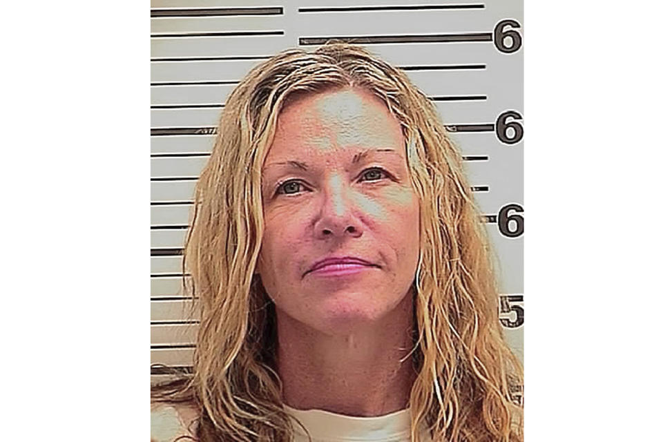 This photo released Friday, March 6, 2020 by the Madison County Sheriff's Office shows Lori Vallow, also known as Lori Daybell. The mother of two children missing for nearly six months had her bond reduced to $1 million Friday during her first court appearance on child abandonment charges in Idaho. Her two youngest children, 7-year-old Joshua "JJ" Vallow and 17-year-old Tylee Ryan, were last seen in September 2019 and police in eastern Idaho say both Lori Daybell and her new husband Chad Daybell have lied about the children's whereabouts. (Madison County Sheriff's Office via AP)