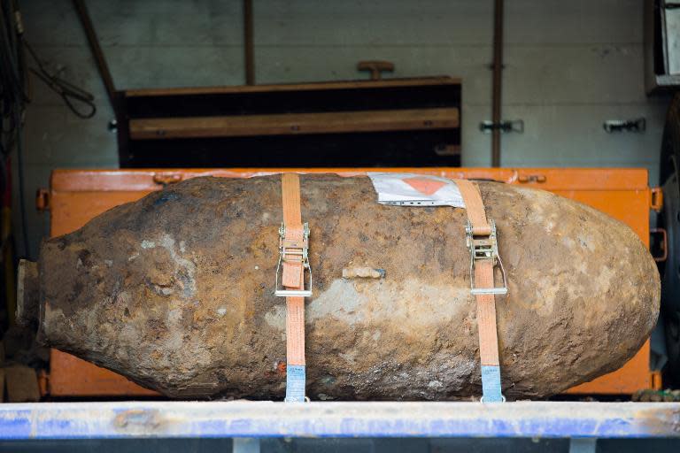 A disarmed World War II bomb is pictured on the platform of a truck near Muehlheim Bridge in Cologne, western Germany, on May 27, 2015