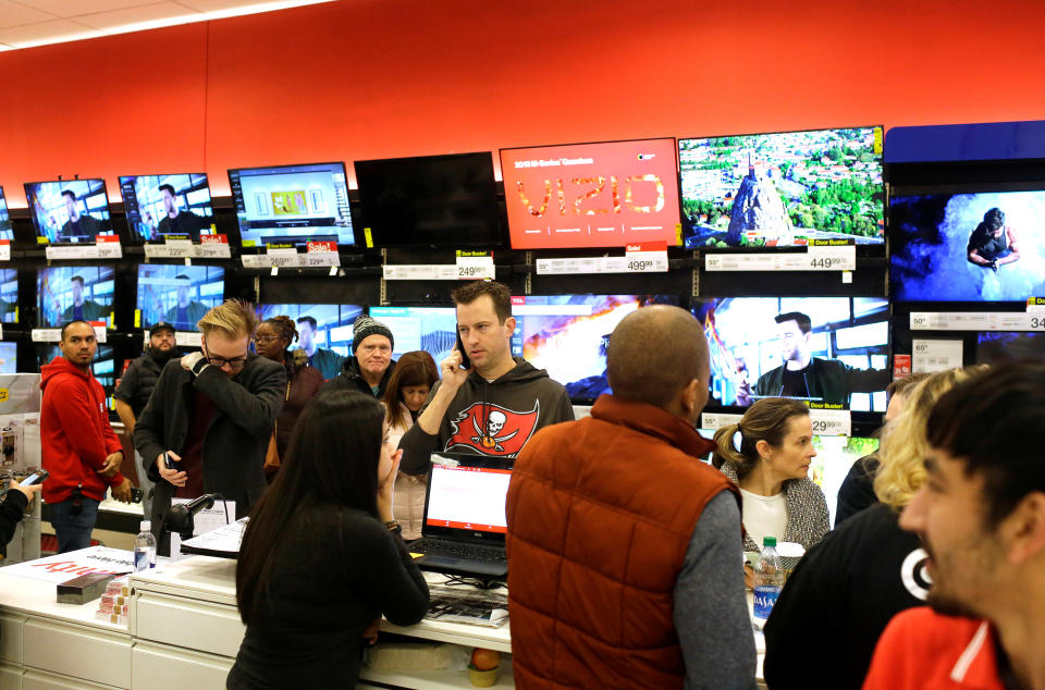 Customers shop during Black Friday sales at a Target store in Chicago, Illinois, U.S. November 29, 2019. REUTERS/Joshua Lott