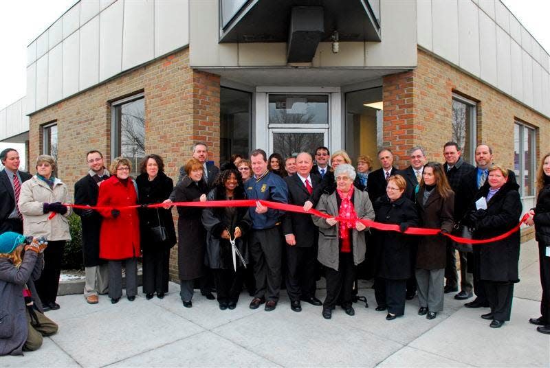 Vuncia Council and others from the community are shown at the ribbon-cutting event for the Monroe County Learning Bank. Council has retired as the center's director.