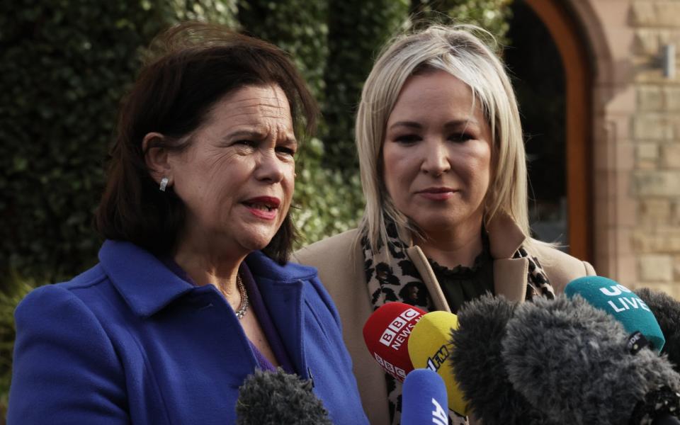 Sinn Fein leader Mary Lou McDonald (left) and vice president Michelle O'Neill speak to the media outside the Culloden Hotel in Belfast - Liam McBurney/PA