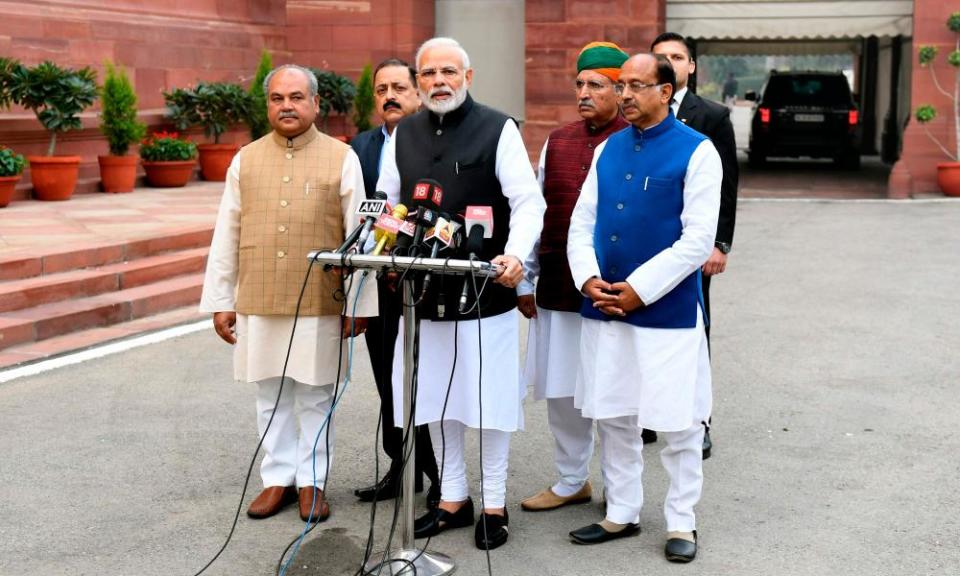 Indian prime minister Narendra Modi stands with BJP leaders at the winter session of parliament in New Delhi.