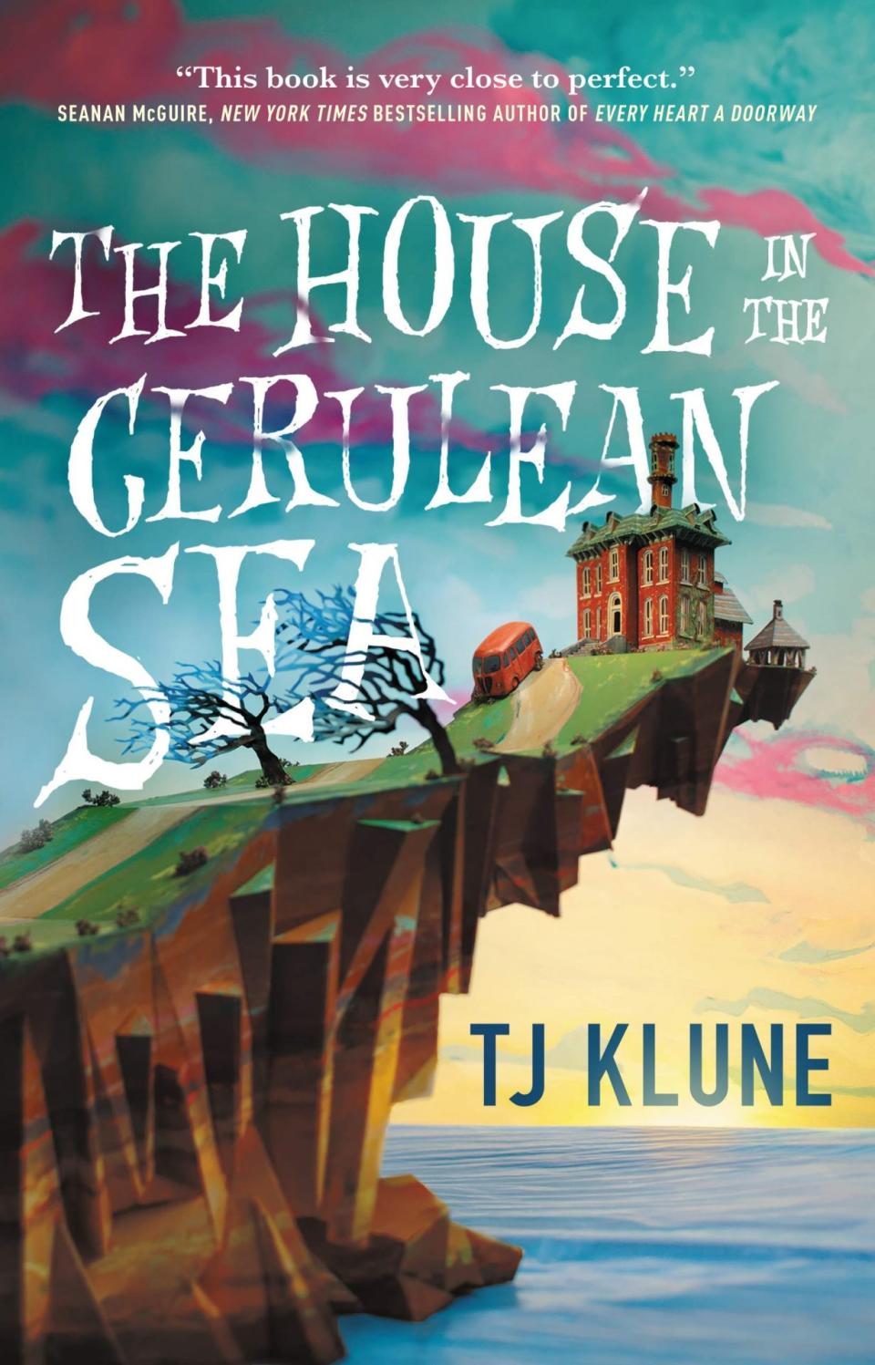 The cover for the House in the Cerulean Sea shows an illustration of a cute orange house on the edge of strangely spindly cliff