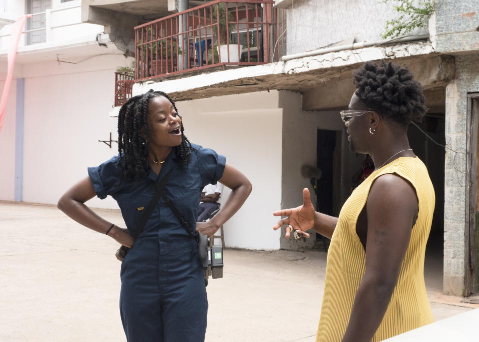 Director Crystal Kayiza speaks with Photographer Campbell Addy. (National Geographic/Elena Gaby)