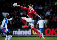 Soccer - International Friendly - Denmark v Panama - Broendby stadium, Copenhagen, Denmark - March 22, 2018. Denmark's Nicklas Bendtner competes with Panama's Felipe Baloy. Ritzau Scanpix/Liselotte Sabroe via REUTERS