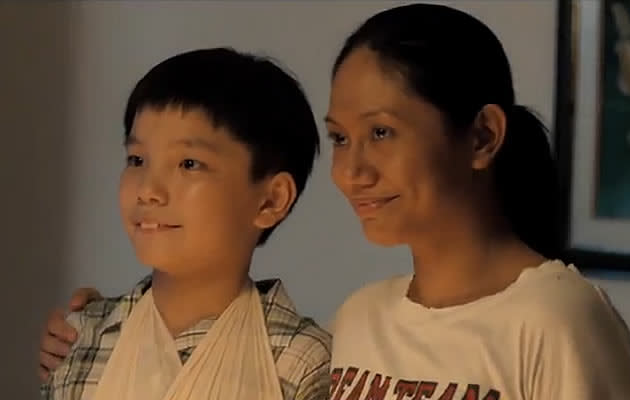 Koh Jia Ler (left) and Angeli Bayani (right) in a scene from local film &#34;Ilo Ilo&#34;. (YouTube Screengrab)