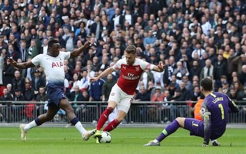 Ramsey was given space to round Hugo Lloris and open the scoring for Arsenal - Credit: AFP