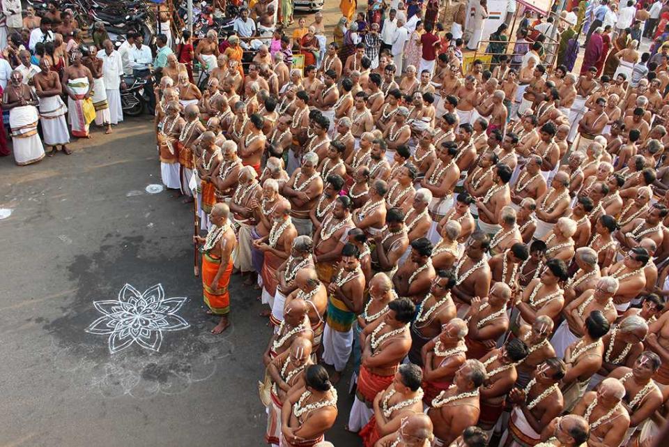 Brahmotsavam at Parthasarathi Temple, Chennai. The Parthasarathi Temple is an 8th century Hindu Vaishnavite temple dedicated to Lord Krishna, located at Triplicane, Chennai. It is one among the 108 divyadesams or holy abodes of Lord Vishnu. The name 'Parthasarathi' in Sanskrit means 'charioteer of Arjuna', and Lord Krishna is worshipped in that role in this temple. This temple is the oldest structure in Chennai. During the month of Chithirai (April-May), the grand car festival of Brahmotsavam is celebrated and devotees recite Tamil Vedam and Nalayira Divya Prabandham, a collection of 4,000 Tamil verses composed by the 12 Alvars or Vaishnava poet-saints.