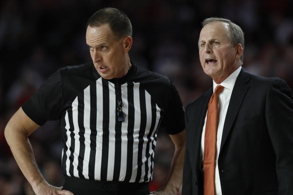 Tennessee coach Rick Barnes speaks with an official during the first half of the team's NCAA college basketball game against Georgia on Wednesday, Jan. 15, 2020, in Athens, Ga. (Joshua L. Jones/Athens Banner-Herald via AP)