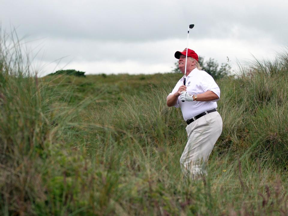 Donald Trump is known as being an avid golfer. Here, he tees off at the The Trump International Golf Links Course in Balmedie, Scotland: Photo by Ian MacNicol/Getty Images