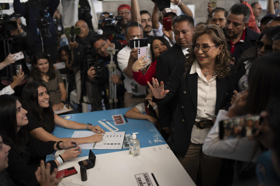 Sandra Torres, presidential candidate with the UNE party, votes in the run-off presidential election in Guatemala City, Sunday, Aug. 20, 2023. (AP Photo/Santiago Billy)