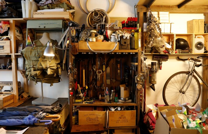 Working station of Kevin Cheung, an upcycling product designer, is pictured in his house in Hong Kong