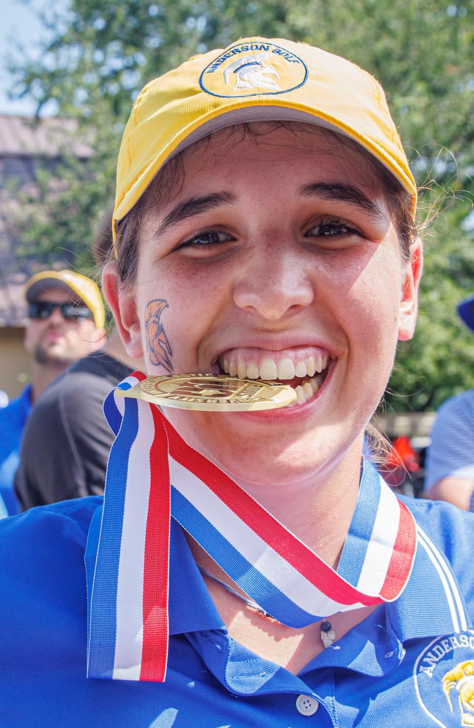 Anderson's Farah O'Keefe savors the gold medal for earning best score at the UIL Class 5A girls state golf tournament Tuesday. Earlier in the month, O’Keefe won the Bluebonnet Championship at Brownwood Country Club by five strokes, finishing with two rounds of 68 to take the title.