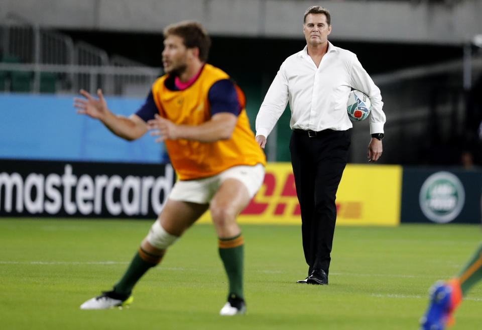 South Africa's coach Rassie Erasmus watches his team warm up ahead of the Rugby World Cup Pool B game at Shizuoka Stadium Ecopa between South Africa and Italy, in Shizuoka, Japan, Friday, Oct. 4, 2019. (AP Photo/Shuji Kajiyama)