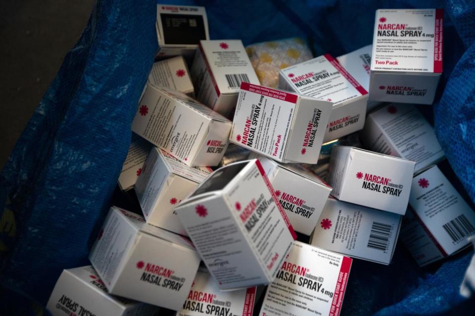 A bag is filled with boxes of Narcan nasal spray for distribution to people living on the street in Los Angeles.