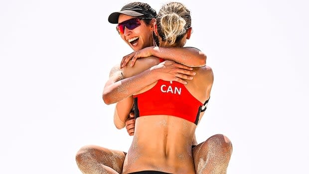 Toronto's Melissa Humana-Paredes, left, and Sarah Pavan of Kitchener, Ont., will be vying for a seventh beach volleyball title together in their 12th World Tour final when they face Talita Antunes and Taiana Lima of Brazil on Tuesday at 5 p.m. ET in Cancun, Mexico. (Submitted by FIVB - image credit)