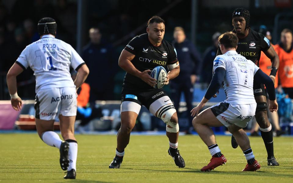 Billy Vunipola of Saracens takes on Ben Curry and Bevan Rodd during the Gallagher Premiership Rugby match between Saracens and Sale Sharks at StoneX Stadium on November 28, 2021 in Barnet, England - GETTY IMAGES
