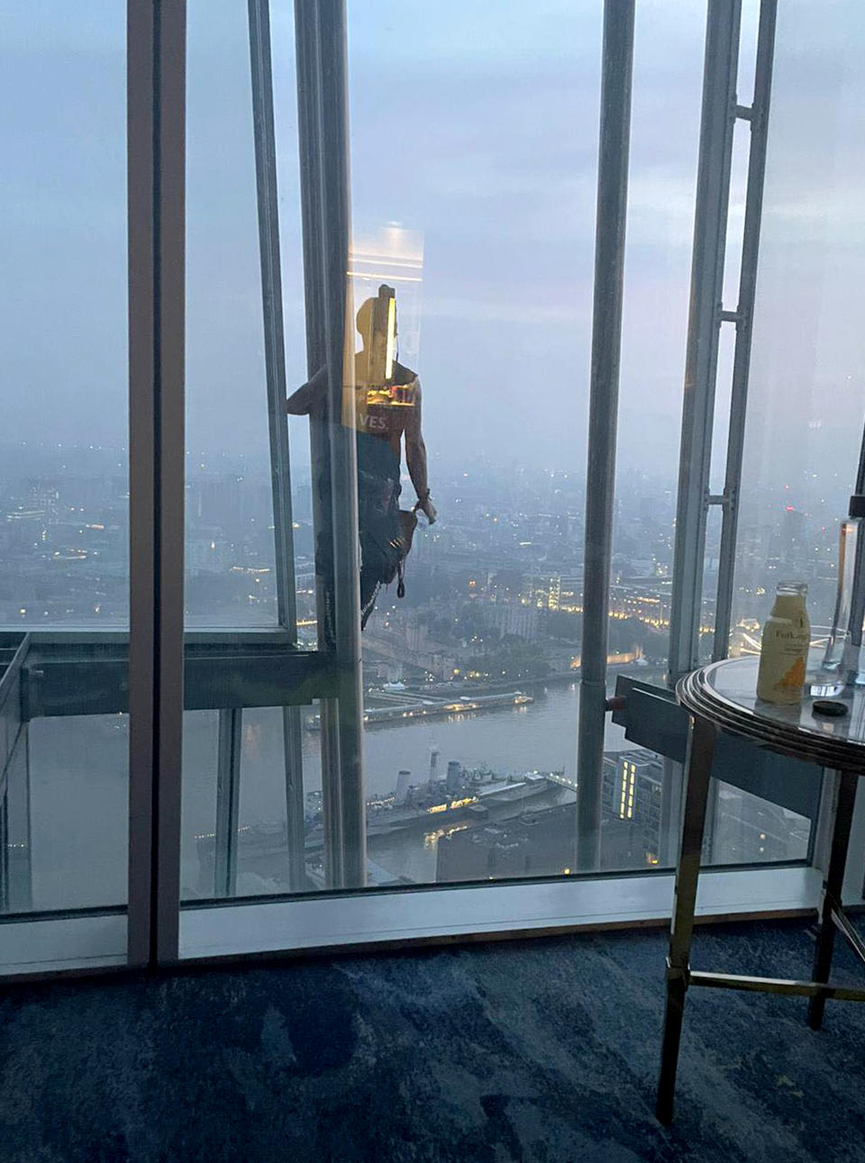 Paul Curphey spotted the climber at 6am as he and his partner lay in bed on the 40th floor of The Shard. (PA)