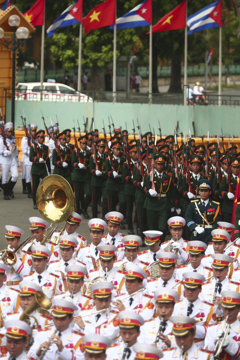 Vietnamese guards of honor arrive for a welcome ceremony for Cuban President Raul Castro in Hanoi Vietnam, Sunday, July 8, 2012. (AP Photo/Na Son Nguyen)