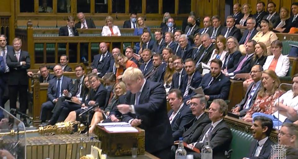 Boris Johnson in the Commons chamber surrounded by Tory MPs without masks (House of Commons/PA) (PA Wire)