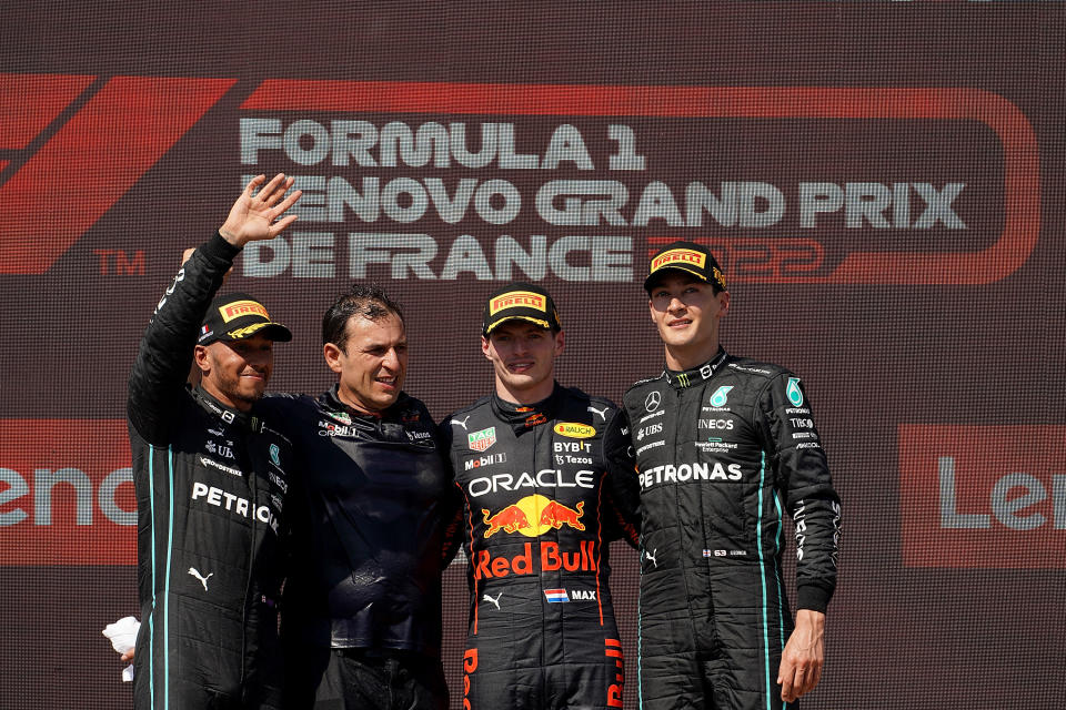 Max Verstappen (pictured middle right) celebrates after winning the French GP with Lewis Hamilton (pictured left) finishing second and George Russell (pictured right) in third. 