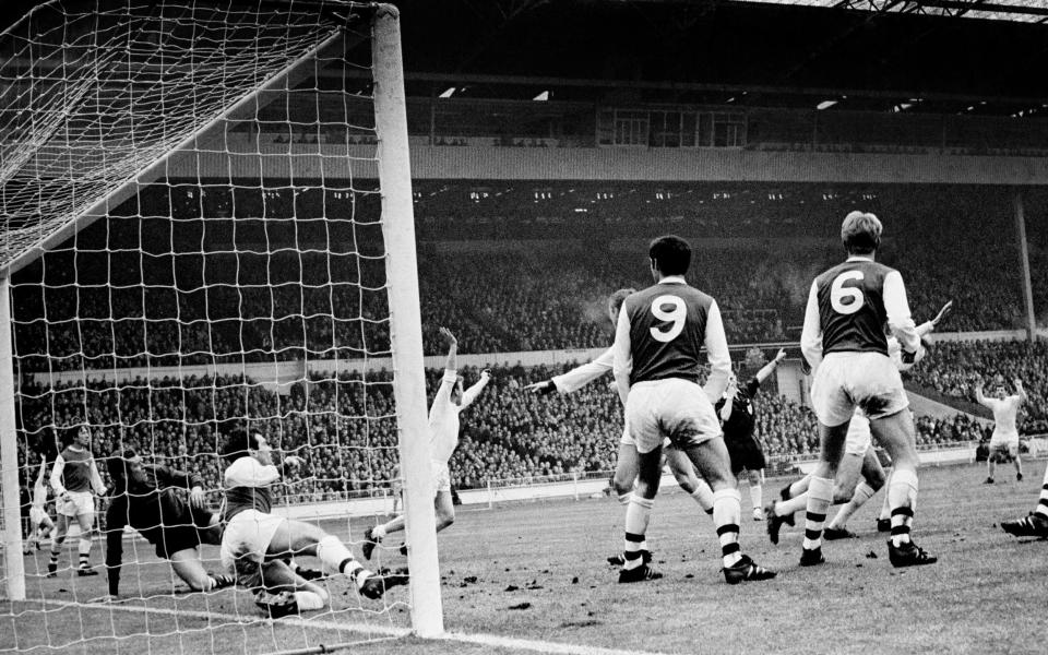 Cooper wheels away after scoring the only goal of the 1968 League Cup final against Arsenal - PA