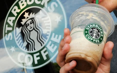 Starbucks logo - Credit: AP Photo/Lisa Poole