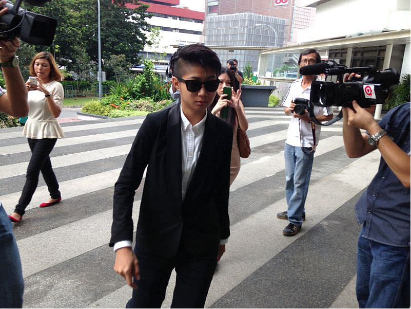 Sam Lo, aka Sticker Lady, turned up for her day in court dressed sharply in a suit.