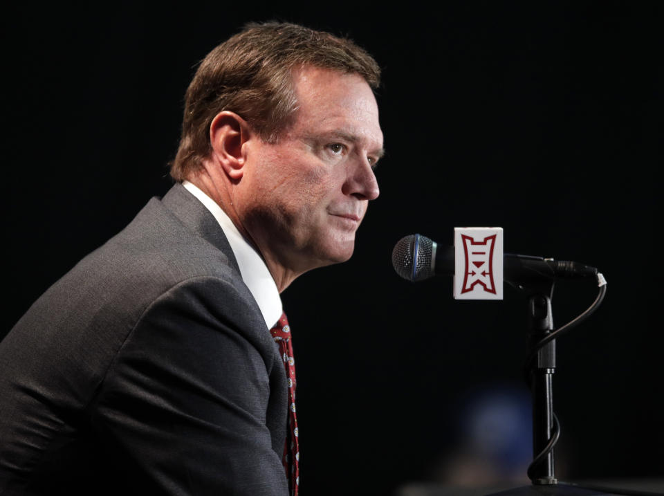 Kansas coach Bill Self listens during the Big 12 Conference NCAA college basketball media day in Kansas City, Mo., Wednesday, Oct. 24, 2018. (AP Photo/Orlin Wagner)