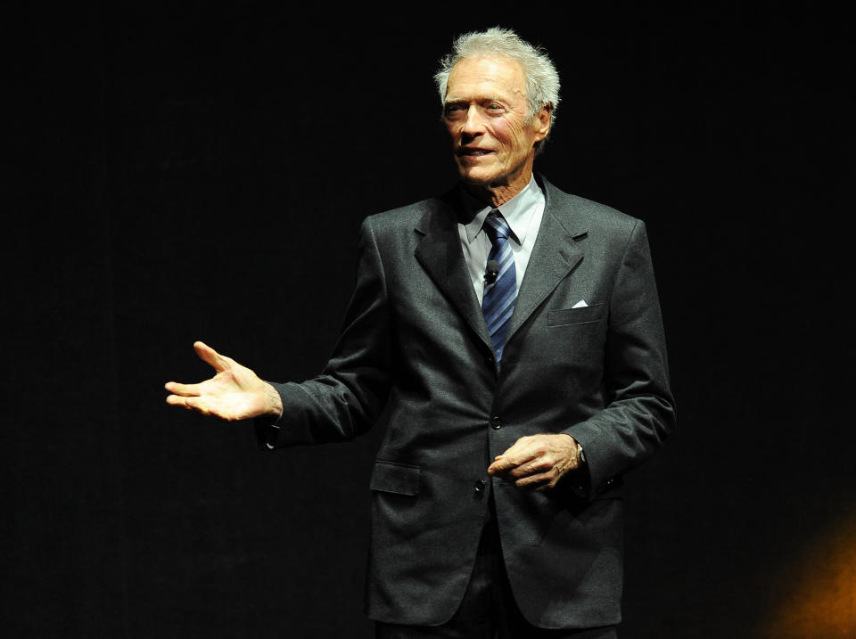 Clint Eastwood, director and producer of the upcoming film "Jersey Boys," introduces a trailer for the film during the Warner Bros. presentation at CinemaCon 2014 on Thursday, March 27, 2014, in Las Vegas. (Photo by Chris Pizzello/Invision/AP)