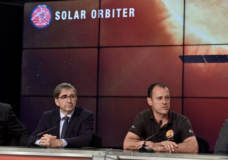 European Space Agency Solar Orbiter Project Manager Cesar Garcia listens as Airbus Defense and Space Solar Orbiter Project Manager Ian Walters discusses the agency's science mission to the sun during a pre-launch news conference at Kennedy Space Center