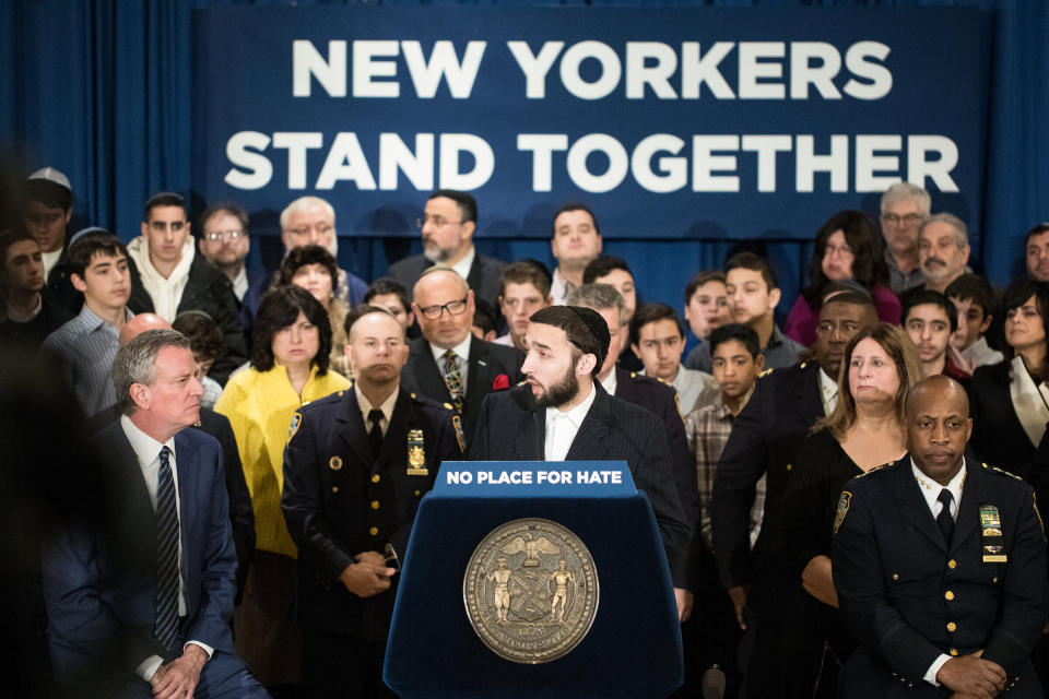 New York Assemblyman Simcha Eichenstein (D) delivers remarks at a rally against anti-Semitism in Brooklyn in February 2019. New York City Mayor Bill de Blasio, left, looks on. (Photo: Benjamin Kanter)